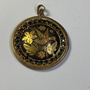 VINTAGE DAMASCENE PENDANT WITH GREEN RHINESTONES.